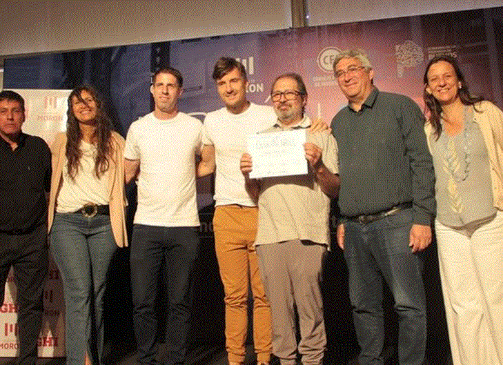 Ghi junto a Rodríguez en la expo de Morón