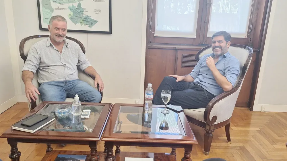 Poletti junto a Carlos Bianco.