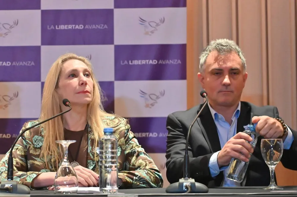 Karina Milei y Sebastián Pareja
