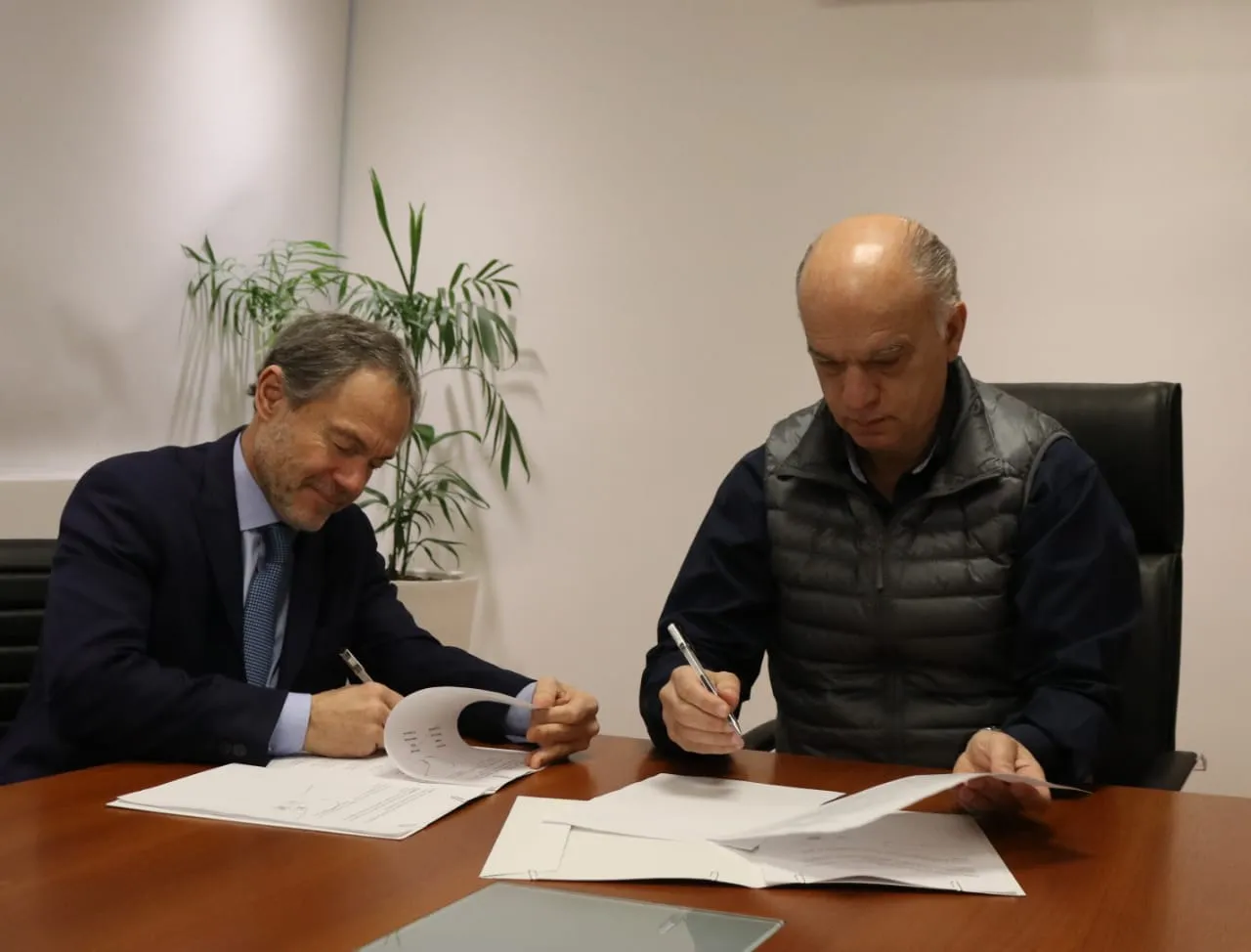 Grindetti firmó convenios con el ministro Ferrari