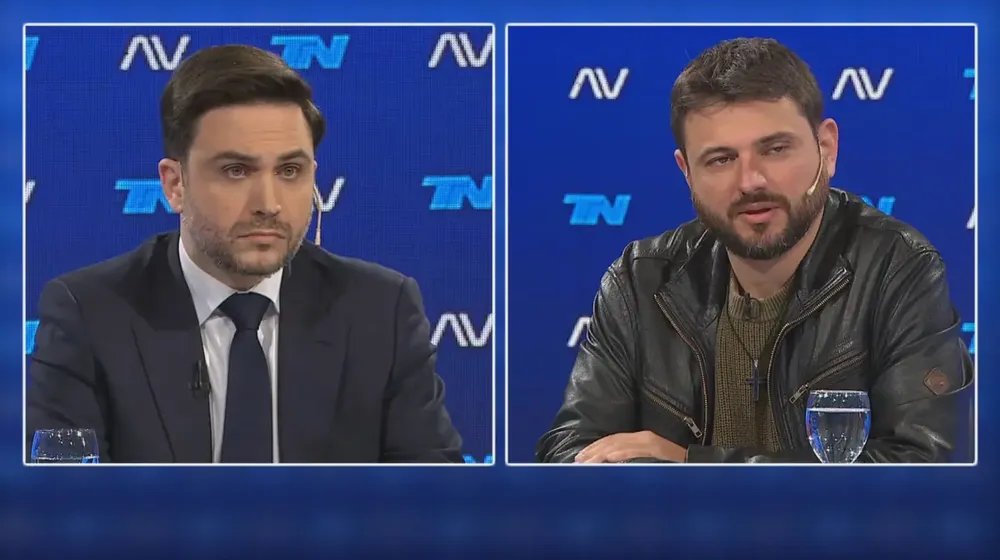 Marra y Grabois en debate televisivo.