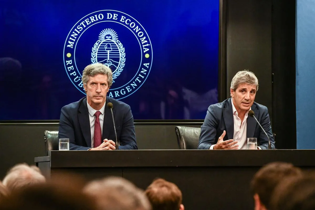 Santiago Bausili y Luis Caputo